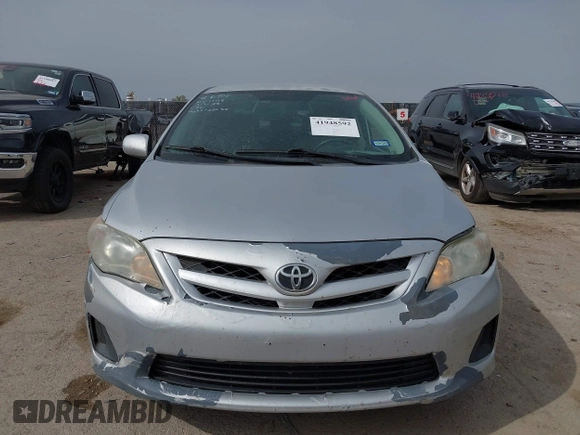 2011 Toyota Corolla L with VIN 2T1BU4EE3BC655772, listed as a IAAI auction lot 41948592 with 67,870 mi miles and . Bid and sale history available at DreamBid. Image 13.