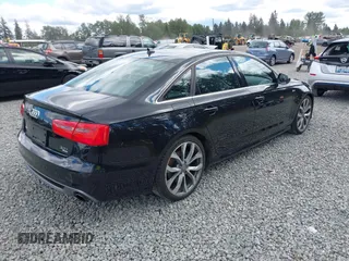 2013 Audi A6 Prestige with VIN WAUHGAFC1DN158567, listed as a IAAI auction lot 42327012 with 145,942 mi miles and . Bid and sale history available at DreamBid. Image 4.
