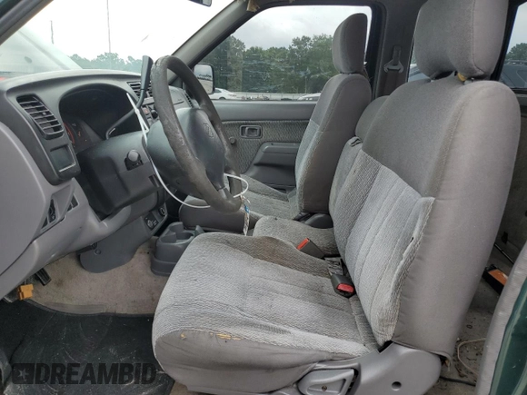 2000 Nissan Frontier XE with VIN 1N6DD26SXYC400648, listed as a Copart auction lot 58756855 with 148,051 mi miles and Salvage title. Bid and sale history available at DreamBid. Image 7.