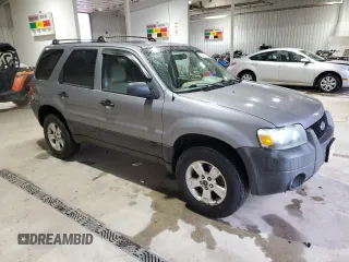 2007 Ford Escape XLT with VIN 1FMYU93107KA67692, listed as a Copart auction lot 72799184 with 230,668 mi miles and Salvage Title. Bid and sale history available at carsss.com. Image 4.