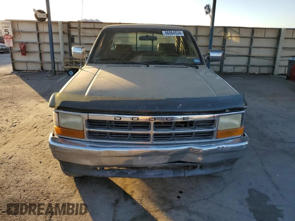 1993 Dodge Dakota z VIN 1B7GG23Y1PS228983, wystawiony jako Copart lot #86064534 z przebiegiem 237 006 mil mil oraz Szkoda całkowita • Salvage title. Historia ofert i sprzedaży dostępna na DreamBid. Obrazek 5.