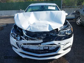 2017 Chevrolet Cruze LS z VIN 1G1BC5SM1H7252008, wystawiony jako IAAI lot #41880627 z przebiegiem 104 693 mil mil oraz . Historia ofert i sprzedaży dostępna na DreamBid. Obrazek 11.