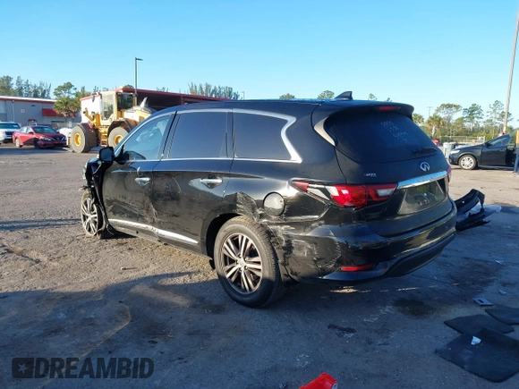2019 Infiniti QX60 LUXE with VIN 5N1DL0MN0KC548592, listed as a IAAI auction lot 41305876 with 142,064 mi miles. Bid and sale history available at carsss.com. Image 3.