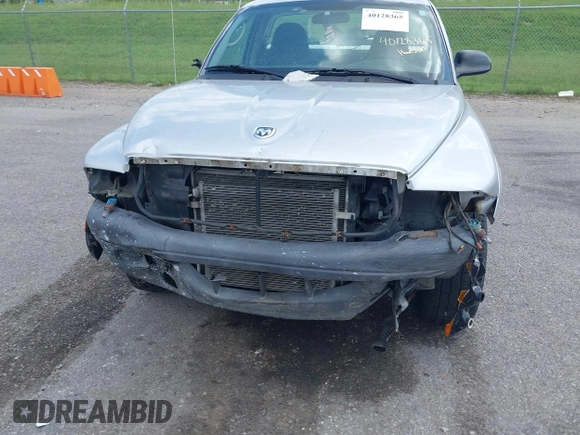 2004 Dodge Dakota z VIN 1D7FL16K04S554963, wystawiony jako IAAI lot #40128365 z przebiegiem 72 818 mil mil oraz . Historia ofert i sprzedaży dostępna na DreamBid. Obrazek 6.