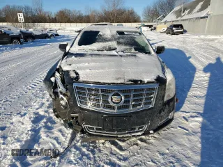 2013 Cadillac XTS Luxury z VIN 2G61P5S31D9207676, wystawiony jako Copart lot #45457795 z przebiegiem 155 033 mil mil oraz Czysty tytuł • Clean title. Historia ofert i sprzedaży dostępna na DreamBid. Obrazek 5.