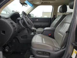 2016 Ford Flex SEL z VIN 2FMGK5C87GBA22153, wystawiony jako Copart lot #53674235 z przebiegiem 163 317 mil mil oraz Szkoda całkowita • Salvage title. Historia ofert i sprzedaży dostępna na DreamBid. Obrazek 7.