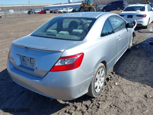 2010 Honda Civic Cpe LX with VIN 2HGFG1B69AH516479, listed as a IAAI auction lot 41757904 with 175,185 mi miles. Bid and sale history available at carsss.com. Image 4.