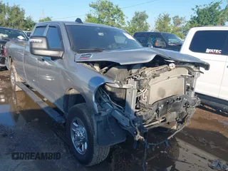 2023 Ram 2500 Tradesman with VIN 3C6UR5HJ1PG555439, listed as a IAAI auction lot 42230594 with 56,459 mi miles and . Bid and sale history available at DreamBid. Image 1.