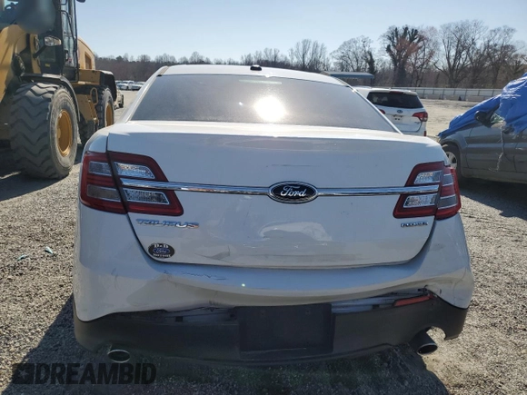 2014 Ford Taurus SE with VIN 1FAHP2D8XEG112805, listed as a Copart auction lot 48975265 with 127,730 mi miles and Salvage Title. Bid and sale history available at DreamBid. Image 6.
