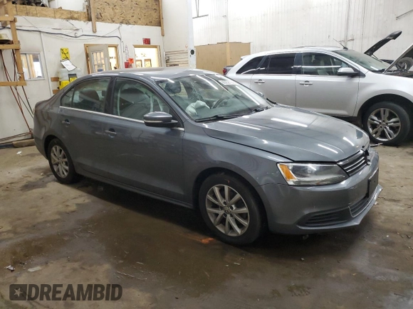 2013 Volkswagen Jetta SE with VIN 3VWDX7AJ2DM309725, listed as a Copart auction lot 86052114 with 70,828 mi miles and Salvage title. Bid and sale history available at DreamBid. Image 4.