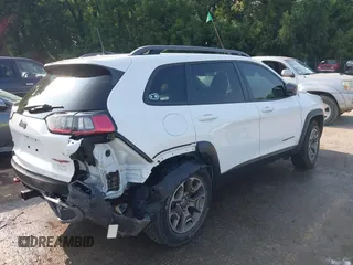 2021 Jeep Cherokee Trailhawk with VIN 1C4PJMBX4MD124980, listed as a IAAI auction lot 42372537 with 55,667 mi miles and . Bid and sale history available at DreamBid. Image 4.