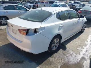 2015 Kia Optima Hybrid with VIN KNAGM4AD8F5088834, listed as a IAAI auction lot 42078516 with 150,069 mi miles. Bid and sale history available at carsss.com. Image 4.