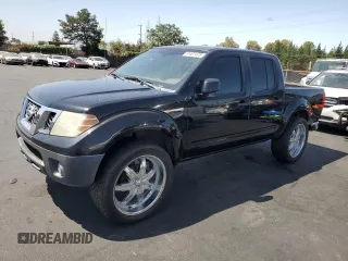2011 Nissan Frontier SL with VIN 1N6AD0ER6BC451352, listed as a Copart auction lot 61461475 with 169,125 mi miles and Salvage title. Bid and sale history available at DreamBid. Image 1.