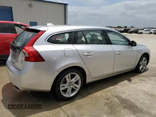 2015 Volvo V60 z VIN YV1612SC1F1191466, wystawiony jako Copart lot #64906184 z przebiegiem 89 444 mil mil oraz Szkoda całkowita • Salvage title. Historia ofert i sprzedaży dostępna na DreamBid. Obrazek 3.