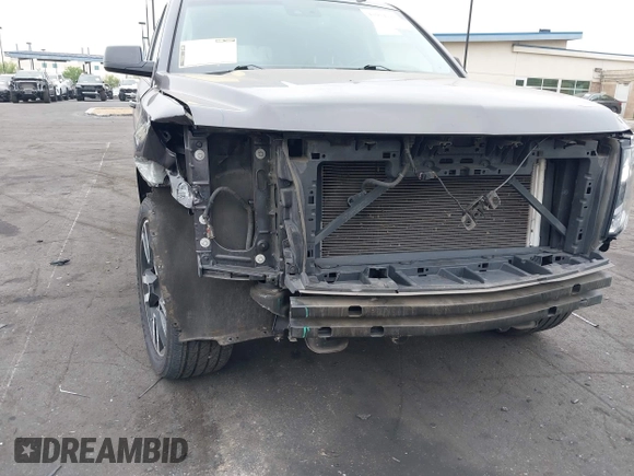 2015 Chevrolet Tahoe LT with VIN 1GNSCBKC1FR233898, listed as a IAAI auction lot 42004048 with 115,779 mi miles and . Bid and sale history available at DreamBid. Image 19.