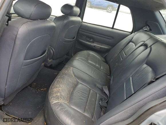 1999 Ford Crown Victoria LX with VIN 2FAFP74WXXX137154, listed as a Copart auction lot 71418784 with 97,589 mi miles and Salvage Title. Bid and sale history available at carsss.com. Image 10.