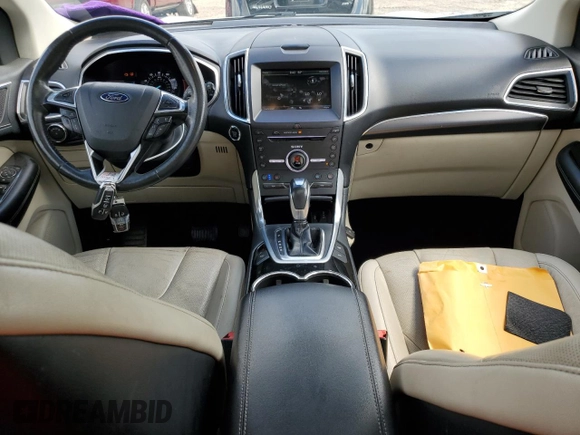 2015 Ford Edge Titanium z VIN 2FMPK3K85FBC05782, wystawiony jako Copart lot #56356595 z przebiegiem 165 202 mil mil oraz Szkoda całkowita • Salvage title. Historia ofert i sprzedaży dostępna na DreamBid. Obrazek 8.