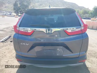 2019 Honda CR-V LX z VIN 2HKRW5H33KH401422, wystawiony jako IAAI lot #42116431 z przebiegiem 119 387 mil mil oraz . Historia ofert i sprzedaży dostępna na DreamBid. Obrazek 17.