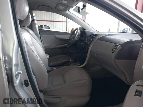 2010 Toyota Corolla with VIN JTDBU4EE2A9107184, listed as a IAAI auction lot 41861299 with 192,519 mi miles. Bid and sale history available at carsss.com. Image 5.