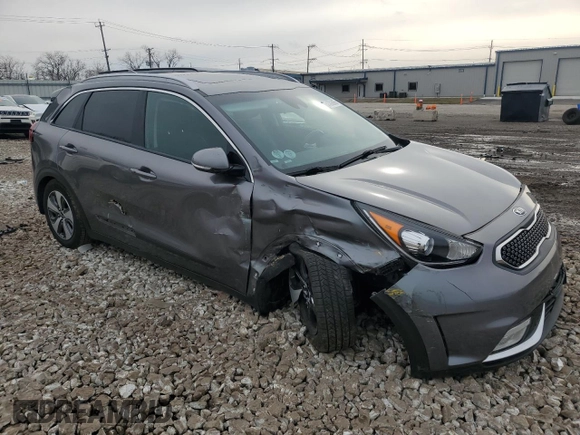 2017 Kia Niro EX with VIN KNDCC3LC8H5090301, listed as a Copart auction lot 51386065 with 57,279 mi miles and Salvage Title. Bid and sale history available at carsss.com. Image 4.