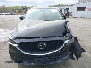 2018 Mazda CX-5 Grand Touring with VIN JM3KFBDM1J0358197, listed as a IAAI auction lot 41967940 with 148,119 mi miles and . Bid and sale history available at DreamBid. Image 12.