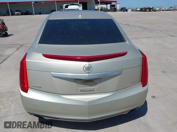 2014 Cadillac XTS Premium with VIN 2G61P5S33E9157607, listed as a IAAI auction lot 42004612 with 111,047 mi miles and . Bid and sale history available at DreamBid. Image 16.