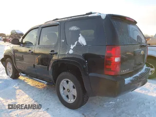 2012 Chevrolet Tahoe LT with VIN 1GNSKBE09CR295291, listed as a IAAI auction lot 41261810 with 133,400 mi miles and . Bid and sale history available at DreamBid. Image 3.