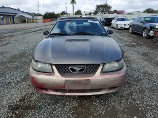 2001 Ford Mustang Deluxe with VIN 1FAFP44401F230975, listed as a Copart auction lot 45358645 with 189,402 mi miles and Salvage Title. Bid and sale history available at carsss.com. Image 5.