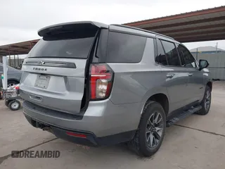 2023 Chevrolet Tahoe Z71 with VIN 1GNSKPKD0PR218416, listed as a IAAI auction lot 41361315 with 63,767 mi miles and . Bid and sale history available at DreamBid. Image 4.