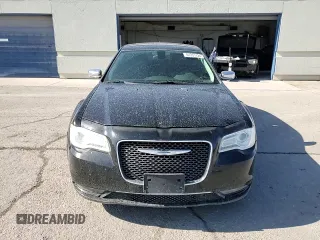 2015 Chrysler 300 C with VIN 2C3CCAET4FH772748, listed as a Copart auction lot 61331724 with 97,856 mi miles and Salvage Title. Bid and sale history available at DreamBid. Image 11.
