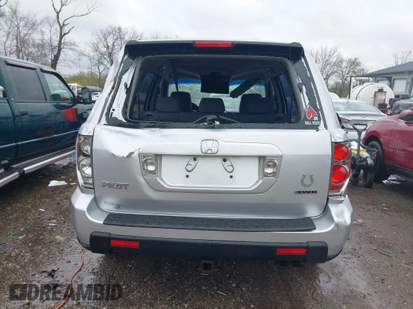 2007 Honda Pilot LX with VIN 2HKYF18157H530370, listed as a IAAI auction lot 41967033 with 214,590 mi miles and . Bid and sale history available at DreamBid. Image 16.