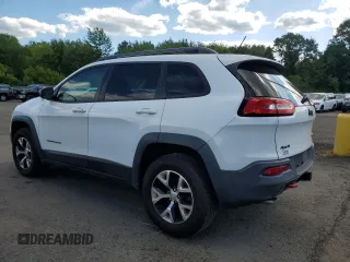 2014 Jeep Cherokee Trailhawk with VIN 1C4PJMBS5EW111360, listed as a Copart auction lot 65607975 with 139,642 mi miles and Clean title. Bid and sale history available at DreamBid. Image 2.