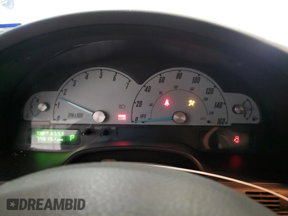 2002 Ford Thunderbird Hardtop Premium with VIN 1FAHP60A32Y125580, listed as a Copart auction lot 77493514 with 74,619 mi miles and Salvage Title. Bid and sale history available at DreamBid. Image 9.