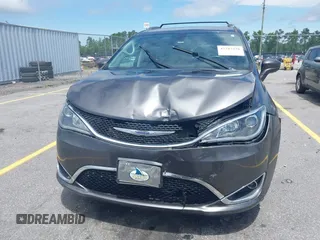 2020 Chrysler Pacifica Touring L with VIN 2C4RC1BG1LR269004, listed as a IAAI auction lot 42287228 with 71,498 mi miles and . Bid and sale history available at DreamBid. Image 12.