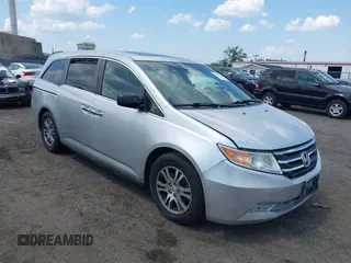 2011 Honda Odyssey EX-L z VIN 5FNRL5H67BB077263, wystawiony jako IAAI lot #42762204 z przebiegiem 251 541 mil mil oraz . Historia ofert i sprzedaży dostępna na DreamBid. Obrazek 1.