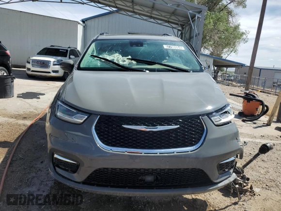 2022 Chrysler Pacifica Touring L z VIN 2C4RC1BG0NR168300, wystawiony jako Copart lot #57766004 z przebiegiem Nie podano mil oraz Nie do naprawy • Non repairable. Historia ofert i sprzedaży dostępna na DreamBid. Obrazek 5.