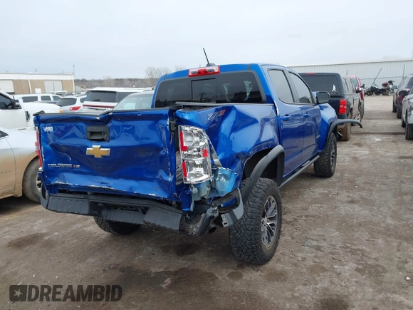 2018 Chevrolet Colorado 4WD ZR2 with VIN 1GCGTEEN7J1208489, listed as a IAAI auction lot 41314735 with 27,600 mi miles. Bid and sale history available at carsss.com. Image 4.