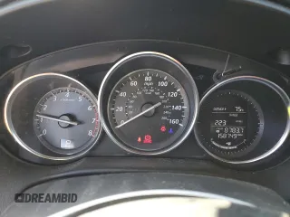 2015 Mazda CX-5 Touring with VIN JM3KE2CY5F0483492, listed as a Copart auction lot 48426065 with 158,749 mi miles and Salvage Title. Bid and sale history available at carsss.com. Image 9.