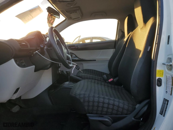 2015 Scion iQ with VIN JTNJJXB09FJ030846, listed as a Copart auction lot 88353405 with 72,208 mi miles and Salvage Title. Bid and sale history available at carsss.com. Image 7.