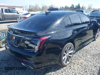 2025 Cadillac CT5 Sport with VIN 1G6DP5RK0S0109112, listed as a IAAI auction lot 41955382 with 5,107 mi miles and . Bid and sale history available at DreamBid. Image 4.