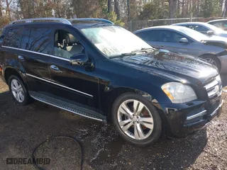 2011 Mercedes-Benz GL-Class GL 450 with VIN 4JGBF7BE6BA628596, listed as a IAAI auction lot 41737405 with 166,040 mi miles. Bid and sale history available at carsss.com. Image 1.