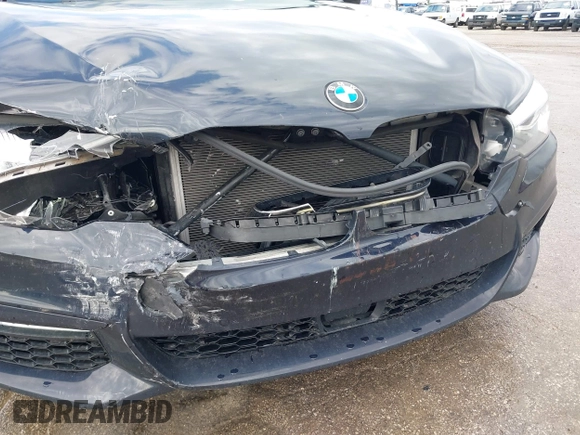 2018 BMW 5 Series 540i xDrive with VIN WBAJE7C58JWD49881, listed as a IAAI auction lot 42091065 with 73,542 mi miles and . Bid and sale history available at DreamBid. Image 6.