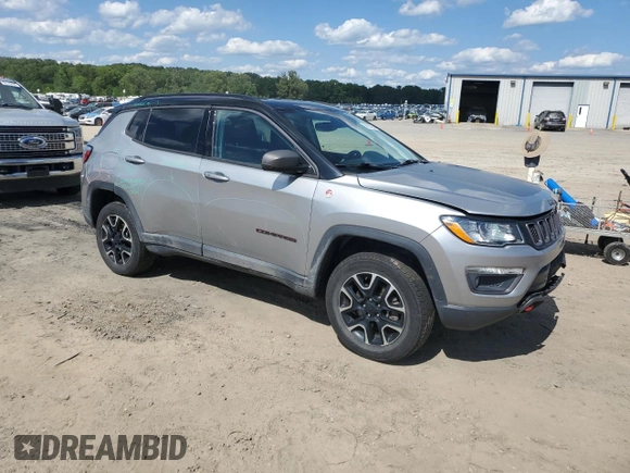 2021 Jeep Compass Trailhawk with VIN 3C4NJDDB5MT571837, listed as a Copart auction lot 58865625 with 75,456 mi miles and Salvage title. Bid and sale history available at DreamBid. Image 4.