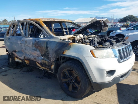 2011 Jeep Grand Cherokee Laredo with VIN 1J4RS4GG2BC618072, listed as a IAAI auction lot 38619850 with Not Provided miles and . Bid and sale history available at DreamBid. Image 1.