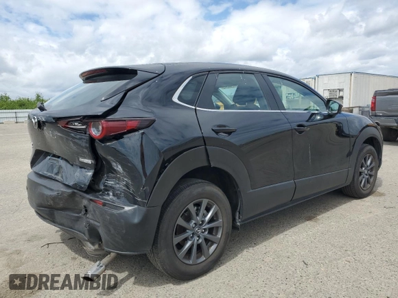 2023 Mazda CX-30 S with VIN 3MVDMBAM7PM555455, listed as a Copart auction lot 51268345 with 34,552 mi miles and Salvage Title. Bid and sale history available at carsss.com. Image 3.