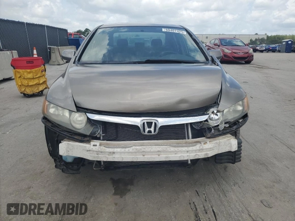 2006 Honda Civic LX z VIN JHMFA16506S006537, wystawiony jako Copart lot #60407425 z przebiegiem 171 482 mil mil oraz Szkoda całkowita • Salvage title. Historia ofert i sprzedaży dostępna na DreamBid. Obrazek 5.