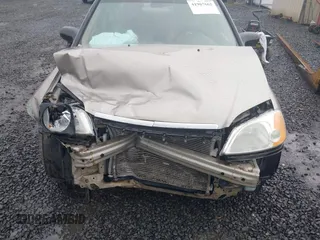 2003 Honda Civic LX with VIN 2HGES16553H620059, listed as a IAAI auction lot 41967662 with 119,918 mi miles and . Bid and sale history available at carsss.com. Image 6.