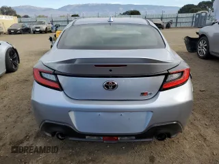 2022 Toyota GR86 Premium with VIN JF1ZNBE19N9750723, listed as a Copart auction lot 83248234 with 21,607 mi miles and Salvage Title. Bid and sale history available at carsss.com. Image 6.