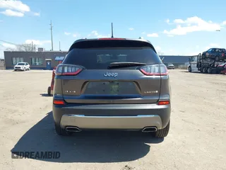 2019 Jeep Cherokee Limited z VIN 1C4PJMDX5KD250730, wystawiony jako IAAI lot #42072064 z przebiegiem 71 183 mil mil oraz . Historia ofert i sprzedaży dostępna na DreamBid. Obrazek 16.