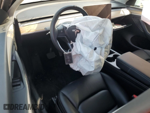 2023 Tesla Model Y Long Range with VIN 7SAYGDEE6PA053274, listed as a Copart auction lot 52865175 with Not Provided miles and Salvage Title. Bid and sale history available at DreamBid. Image 8.